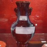 A Chinese vase glazed in red and blue