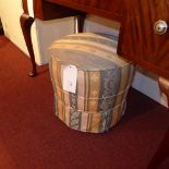 A French foot stool upholstered in yellow and blue striped damask