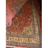 A fine North West Persian Sarouk rug 155 x 110 cm central floral pendant sapphire medallion on a