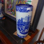 A pair of blue and white Ironstone umberella stands with Chinese landscape pattern