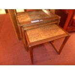 A G-Plan teak nest of three tables with formica style tops