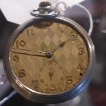 A white metal (possibly silver but unmarked) pocket watch in working order