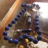 A Lapiz Lazuli necklace and the matching earrings