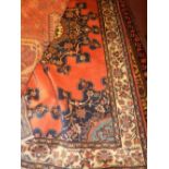 A fine North West Persian Tafresh rug 203 cm x 133 cm central pole sapphire medallion on a rouge