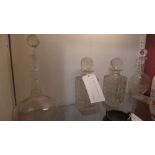 A pair of hobnail cut glass decanters and two others