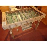 An early C20th table football game with playing balls