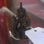 A miniature Tibetan bronze Buddha