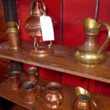 A collection of copper and brass bound mugs and the matching spirit kettle