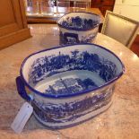 A pair of blue and white oval form Ironstone planters decorated with Chinese landscape pattern