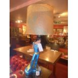 A 1950's American table lamp in the form of a dancer and with shade