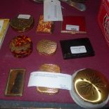A Japanese tortoishell box with a collection of ladies compacts and similar items