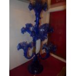 A blue glass epergne of seven branches