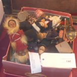 A collection of vintage dolls including examples representing countries around the world and various