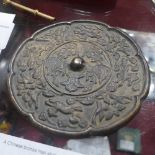 A Chinese bronze Han style mirror