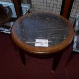 A C19th walnut low table with circular inset grey marble top and raised on square tapering supports