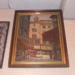 An oil on canvas French street scene signed bottom right