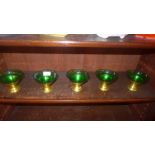 A set of five American 1950's green glass sundae dishes
