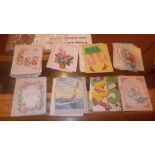 A collection of fifty old greetings cards, unused
