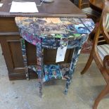A novelty comic book wrapped demi-lune side table united by undertier