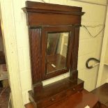 A late C19th mahogany dressing mirror the swing plate above two base drawers