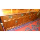 A Chinese hardwood sideboard having drawers above cupboard