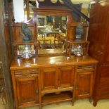 A late Victorian satin walnut sideboard the mirrored upstand above drawers and cupboard
