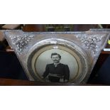 A Monochrome print portrait of a gentleman in husk carved frame