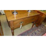 A late C19th mahogany side table the rectangular top above deep drawer raised on turned supports