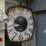 A garden wall clock 'Cafe de Gare'