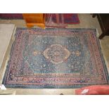 An Egyptian rug the blue ground with cen