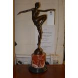 A bronze Art Deco style dancer on a marb