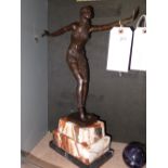 A bronze Art Deco style dancer on a marb