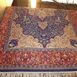 A hand knotted Persian carpet the blue ground with central medallion within single border