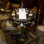 A pair of Tiffany lamps with multi colou