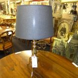 A pair of chromium table lamps with shad