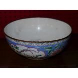 A Chinese style bowl with floral and bir