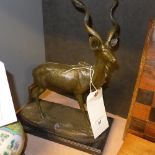A bronze cast of a Kudu on marble base