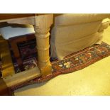 A hand knotted Hamadan rug the red groun