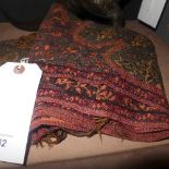 A woollen paisley shawl