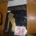 A 1954 'Folies Bergere' brochure, black felt cover with gold embossed nude, complete with ticket