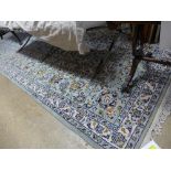 A part silk Persian Nain carpet the beige and blue ground with allover stylized decoration
