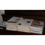 A large quantity of Antiques Trade Gazette magazines and other Auction House brochures including