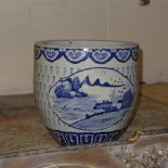 A Chinese style blue and white planter of bulbous form