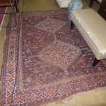 A hand knotted Shivran rug the blue ground with allover motif detail