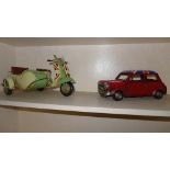 A red painted union jack flag mini and a green painted sidecar