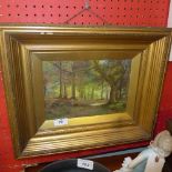 An oil on canvas of woodland scene ''Oak wood'' monogrammed PB in gilt frame