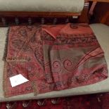 An Eastern silk paisley pattern shawl