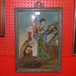 A Japanese painting on glass of two ladies on a hillside in a hardwood frame