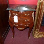 A Continental inlaid commode chest of small proportions fitted three drawers with gilt metal