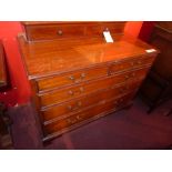 A mahogany chest fitted two short and three long drawers on bracket feet